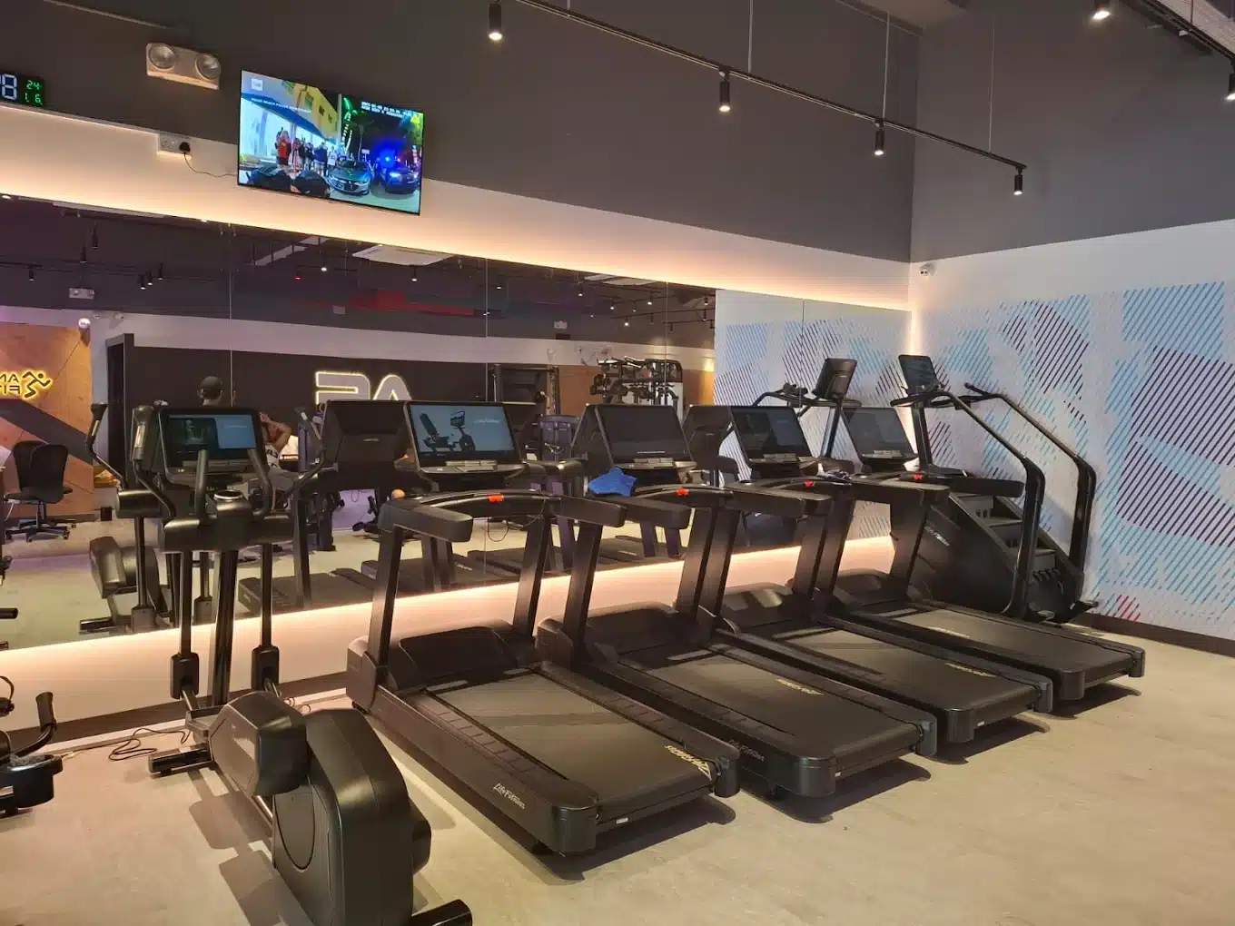 A row of brand new treadmills located in Anytime Fitness Yishun East which is run by the ReFormd Group